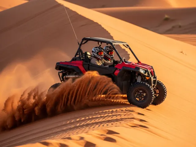 Dune buggies riding across the Dubai desert